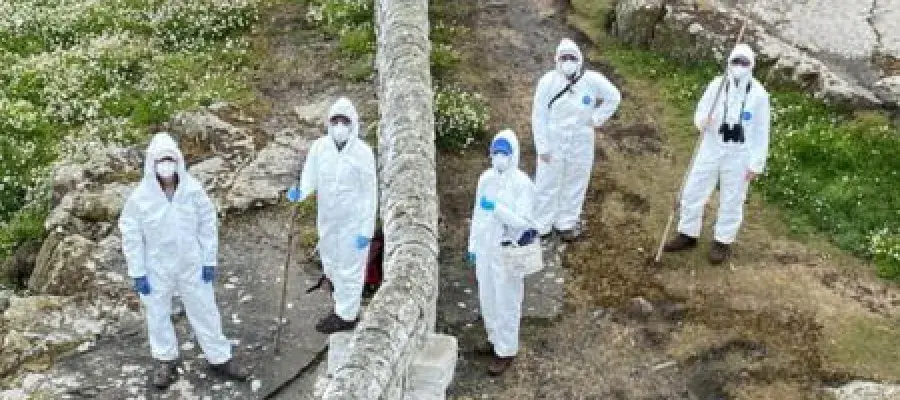 Scientists in personal protective gear