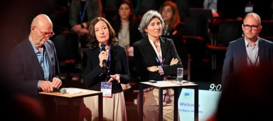 People talking at European science and innovation conference