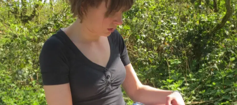 Emily Simmonds working in the field